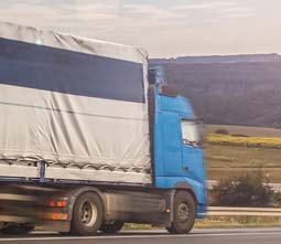 Semi-tractor-trailer truck on the road