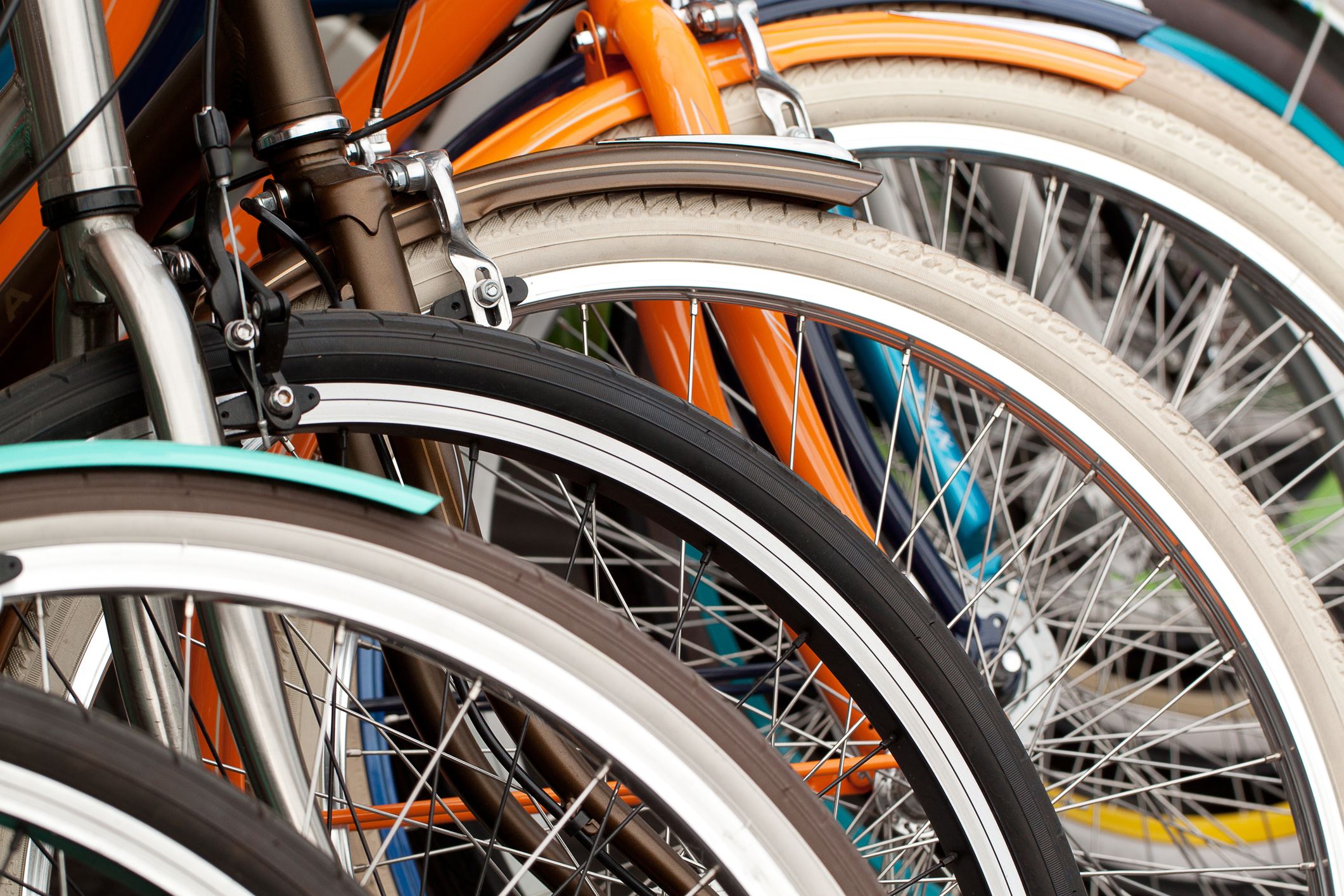 Colorful bicycles and their wheels