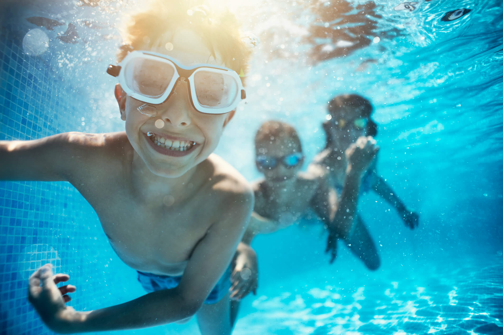 kids swimming in pool